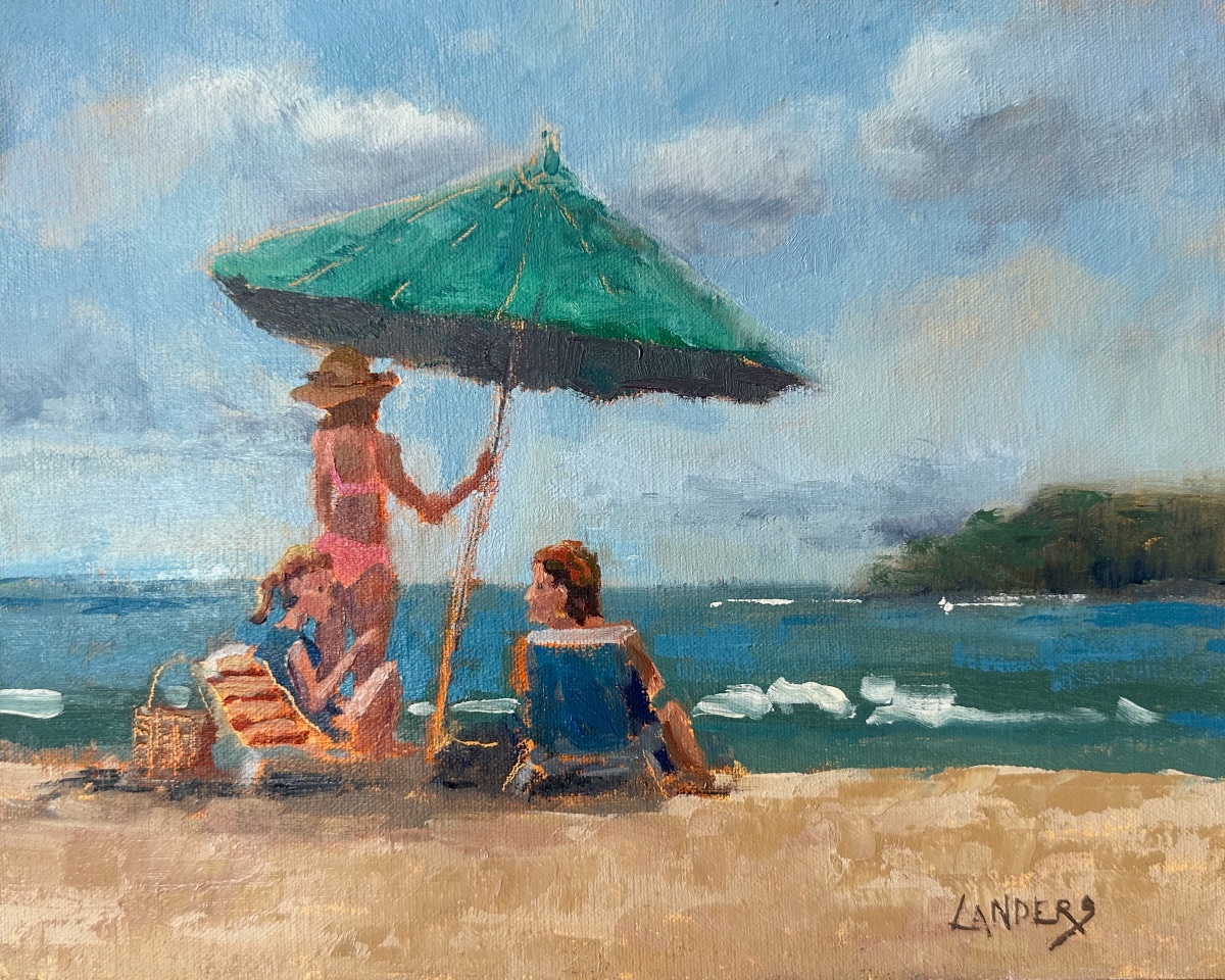 Susan, Kelly and Kay under a green umbrella